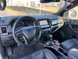 the interior of a car with a steering wheel, dashboard, and dash board