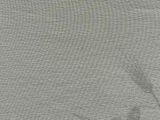 gray t - shirt with white logo on the chest