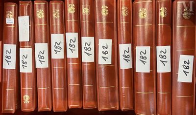 many books on a shelf with price tags on them