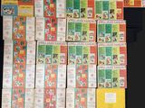 a lot of old baseball cards on the table
