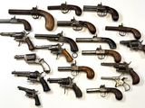 a lot of old guns that are on the table