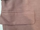 a close up of a person ' s pants with a pocket