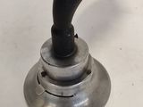 a close up of a metal object on a table