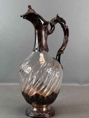 a glass vase that is sitting on a table