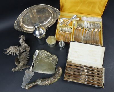 silverware and silverware in a box on a table