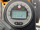 a close up of a motorcycle with a digital display