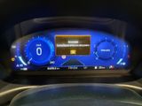 the dashboard of a car with a digital display on it ' s dashboard
