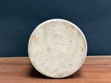 an image of a close up of a white plate on a wooden table