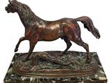 bronze sculpture of a horse running on a marble base