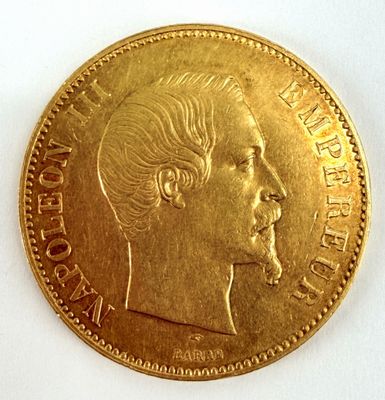 l'image d'une pièce d'or sur laquelle figure le visage d'une femme