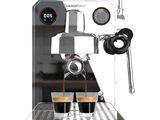 an image of a coffee machine with two cups of coffee