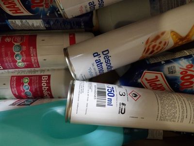 several cans of food are stacked on top of each other