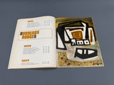 an open book with a picture of a building on it