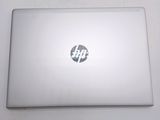a laptop that has a hp logo on the screen