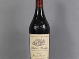 a bottle of wine that is sitting on a table