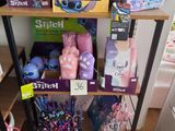 a lot of toys on the shelves in the store