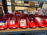 many red bins that are sitting on a shelf