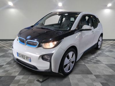an image of a white and black car in a garage