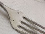 a fork with a hole in the middle of it
