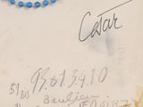 a picture of a blue beaded necklace on a piece of paper