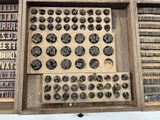 an old typewriter with many different types of letters in it