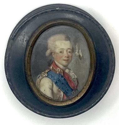 portrait d'un homme en uniforme militaire dans un cadre ovale bleu