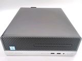 the dell desktop computer is sitting on a white surface