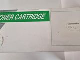 a white box with a green and black label on it