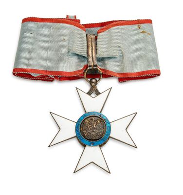 une image représentant une médaille ornée d'un ruban bleu et d'une étoile