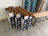 several boxes are stacked on top of each other in a room