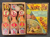 a box that has some wooden toys inside of it