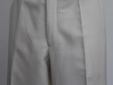 a close up of a mannequin torso wearing a white suit and tie