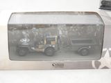 two toy cars in a box on a table