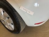 a close up of a car with a sticker on the side of it