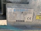 a label on the back of a machine that is sitting on the ground