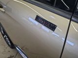 a sticker on the door of a car that says trust us