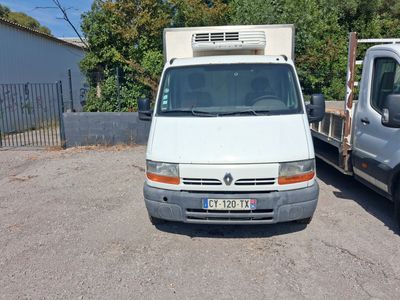 a white van that is parked next to a white truck