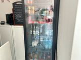 an image of a refrigerator with drinks inside of it