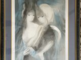 painting of a woman and a cat in a frame on a wall