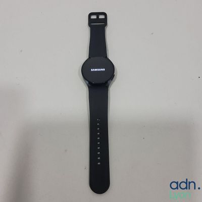 a close up of a smart watch sitting on a table