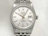 an image of a rolex watch with a white dial on a stainless steel bracelet