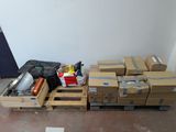 a pallet full of boxes and other items on the floor