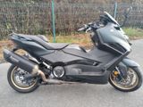 a motorcycle that is parked on the side of the road