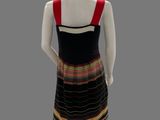 a mannequin dressed in a multicolored dress