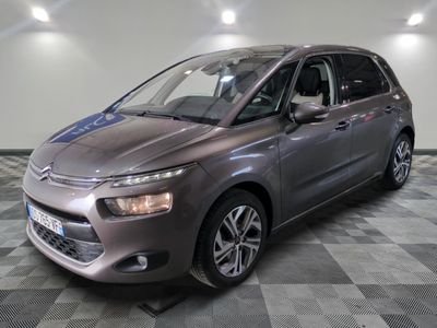 the grey citrole is parked on a checkered floor