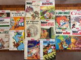 a lot of cartoon books that are on the table