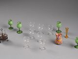 a lot of different glass items on the table