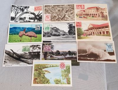 some old postcards of different types and sizes are on a table