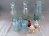 many bottles and bottles that are sitting on a table