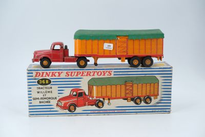 two toy trucks that are sitting on top of a box